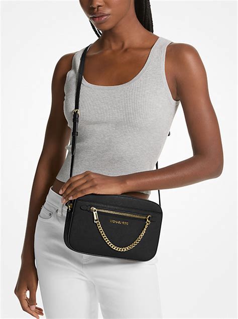 michael kors crossbody jet set large fawn|More.